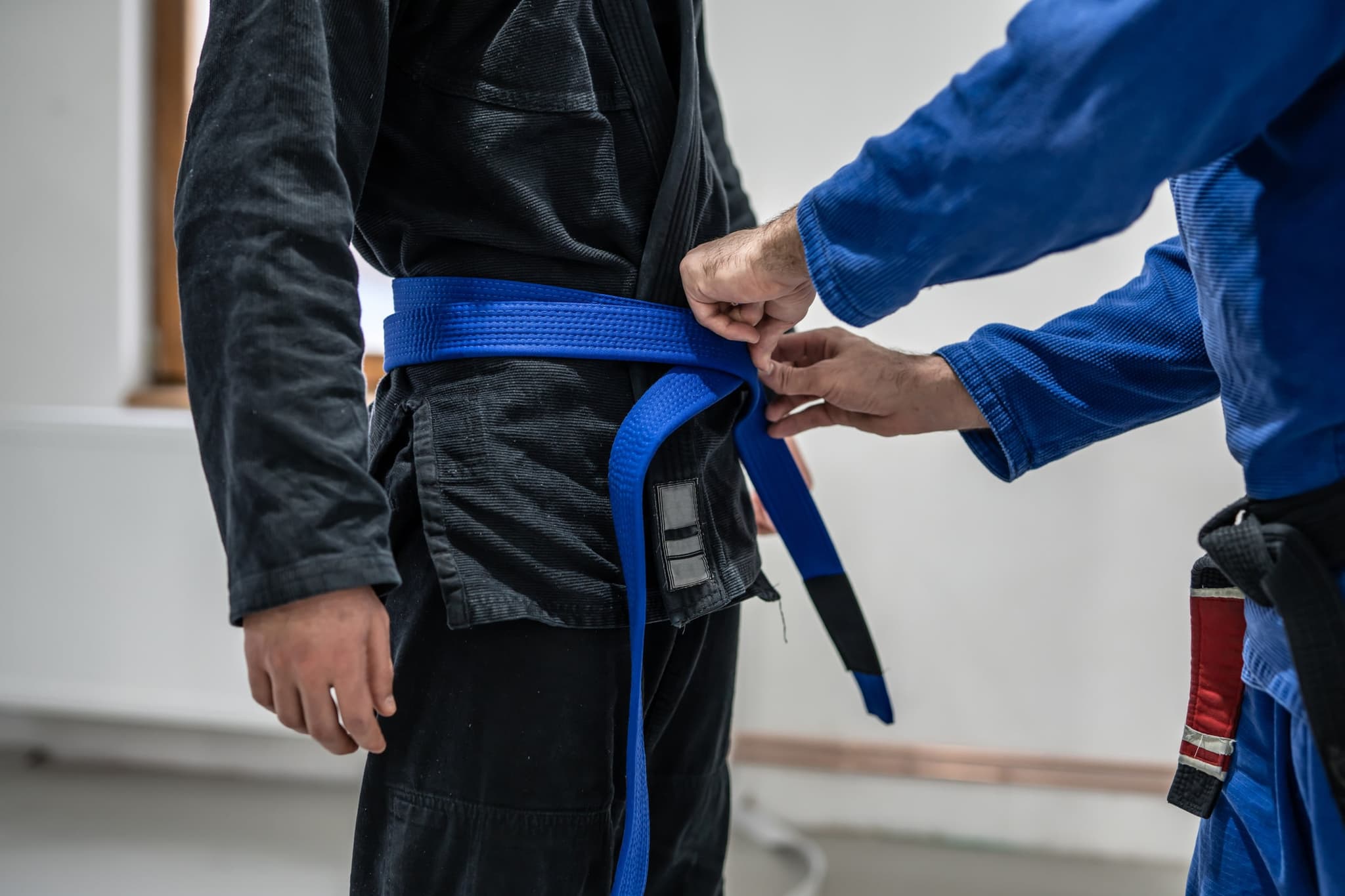 BJJ Blue Belt: What Does it Mean & What Does it Take?